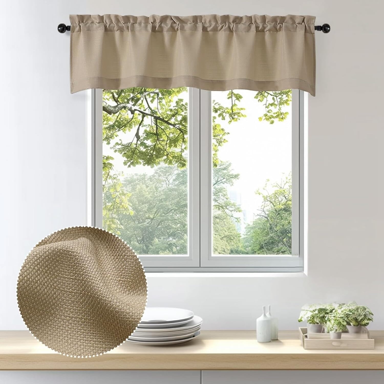 One camel-colored valance across the top of a window with an inset fabric detail